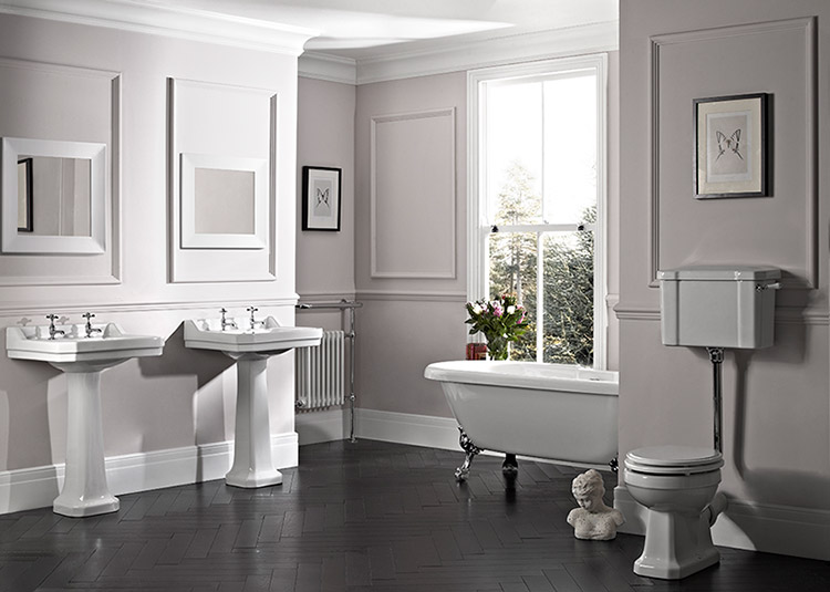 Traditional bathroom with white panelling, Dual rink and a claw foot bath