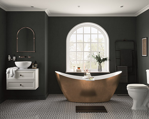 A bathroom with a dark grey colour scheme and the focal point of a copper bath tub