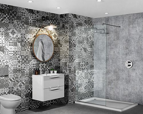 Modern wet room bathroom, with a bold geometric print on one tiled wall