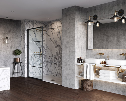 A walk-in shower and sink with grey and marble tiling with hints of gold